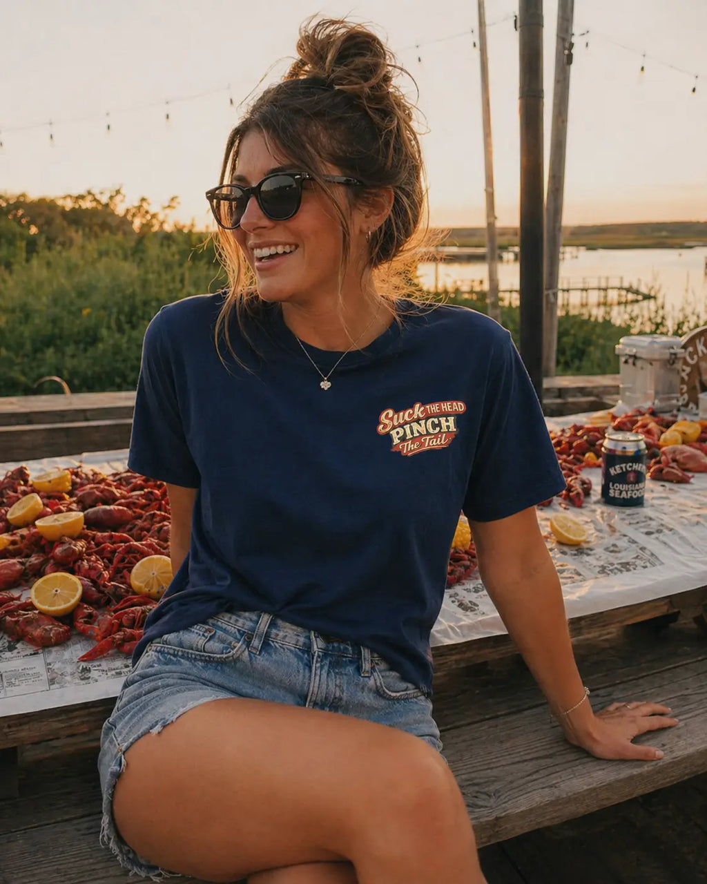 Back graphic of Let The Good Times Boil crawfish tee — bold crawfish and beer design on navy Comfort Colors shirt