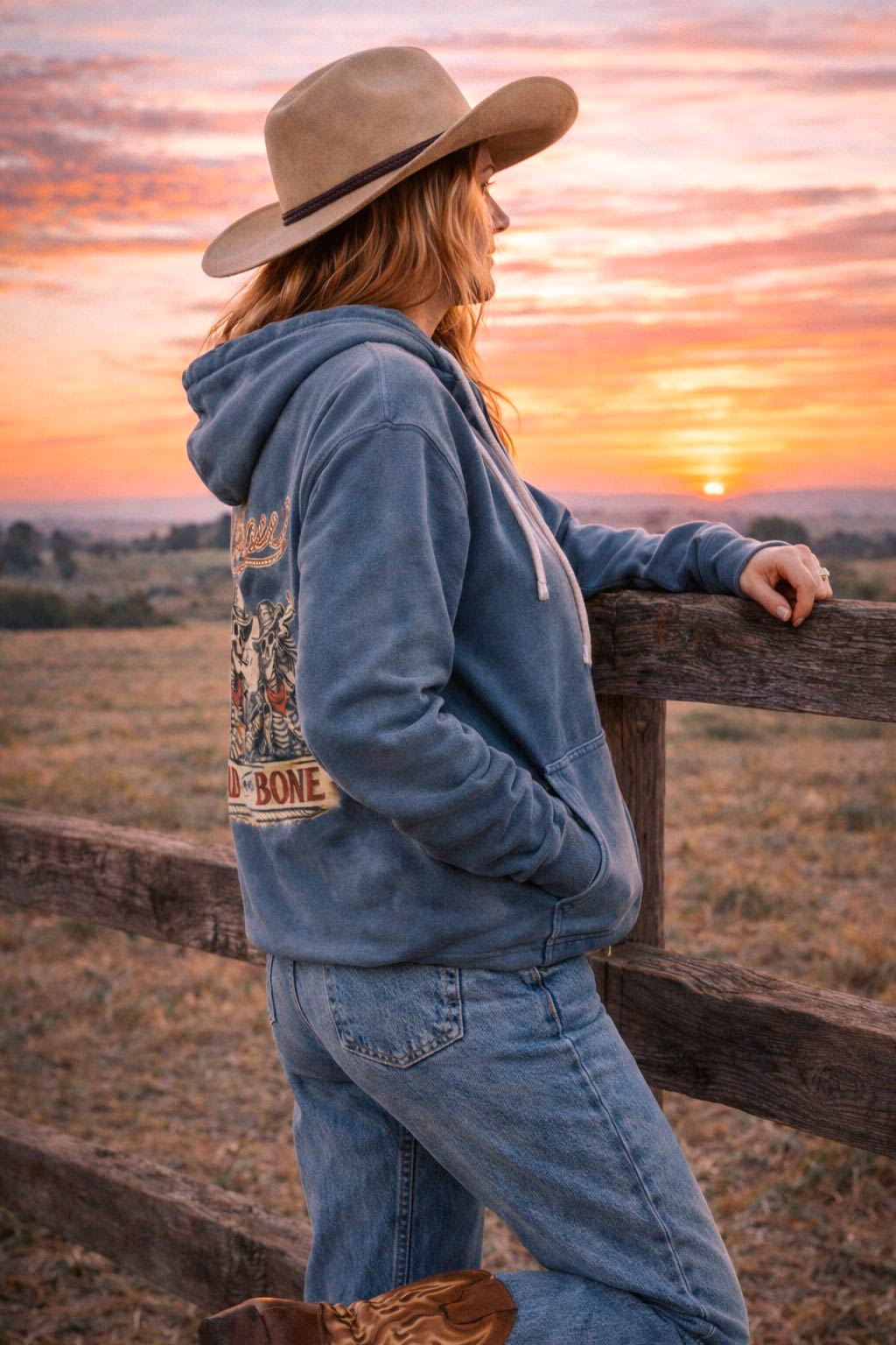 Back view of western cowgirl hoodie featuring vintage graphic design